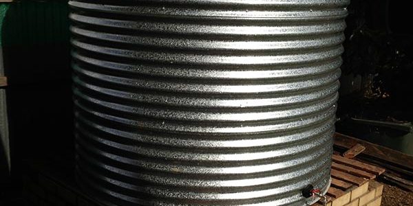 galvanised steel rainwater tank on existing base