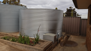 two galvanised tanks side by side installed at house in Greenock SA