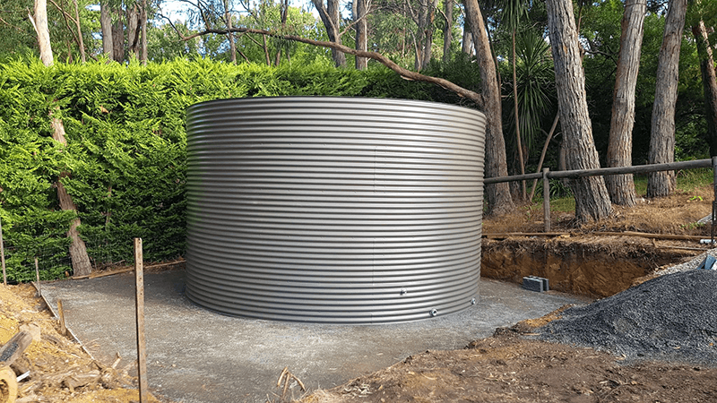 Woodland Grey Aquaplate Rainwater Tank on base in Aldgate SA